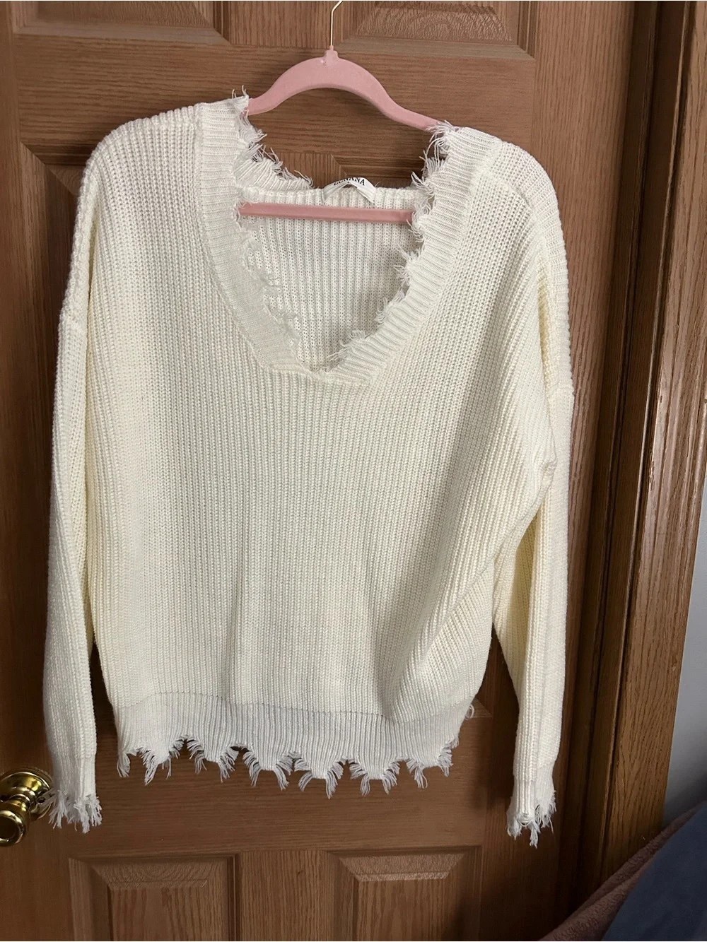 Distressed V-Neck Cream Knit Sweater